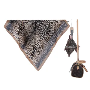 Square satin scarf with leopard snake print and brown border on white background