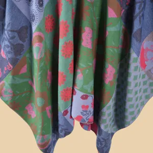 Macro detail of multicolored floral jacquard knit fabric with intricate textures