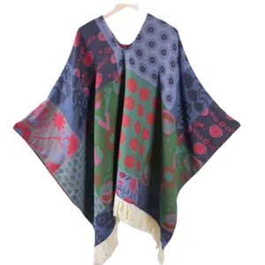 Women's floral jacquard poncho shawl with ethnic print patterns and decorative fringes