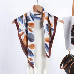 Elegant 70cm silk satin square scarf featuring autumn leaf print and brown borders
