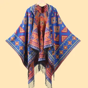 Bohemian geometric hooded poncho cape with ethnic patterns and black fringe tassels