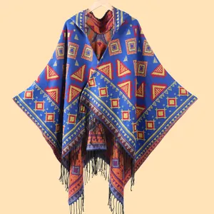 Ethnic geometric hooded poncho with tassels in royal blue for outdoor travel