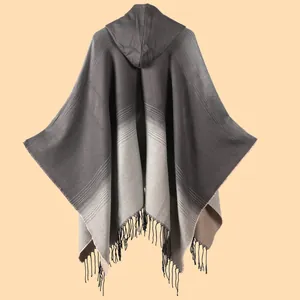 Women's hooded knit shawl with gray gradient stripes and decorative tassel hem