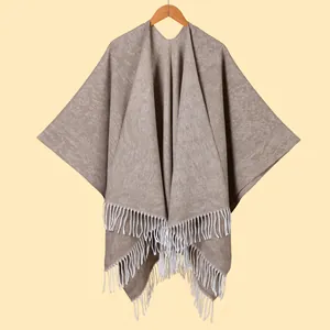 Elegant solid beige women shawl with thick knitted texture and long white tassel details