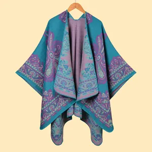 Macro view of blue and purple paisley jacquard knitting texture on a thick shawl