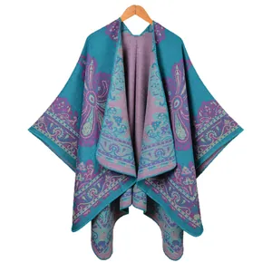 Lake blue knit poncho cape with paisley pattern and geometric floral designs for women