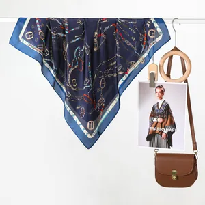 Classic navy blue silk scarf with gold chain and equestrian print for elegant women