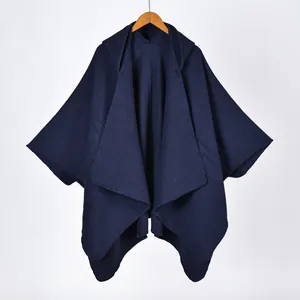 Navy blue hooded cloak cape for women made of warm thick fabric in a solid color design