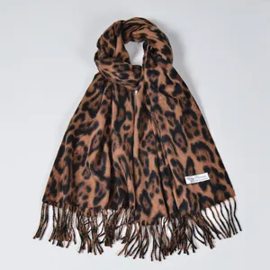 Classic leopard print cashmere scarf with fringe details for autumn and winter warmth
