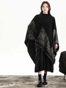 Detail of elegant vintage forest jacquard on thick knitted pashmina shawl for women