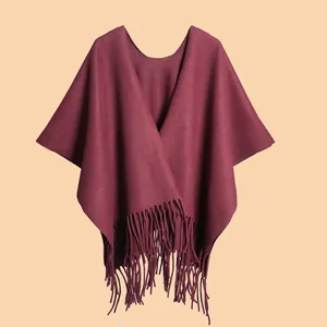 Classic burgundy winter shawl cape for women with thick knit fabric and long tassel fringe