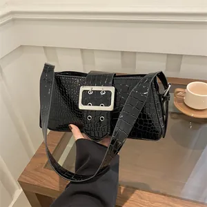 Elegant black crocodile pattern shoulder bag with a silver metal buckle for women