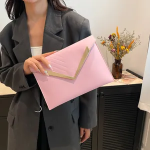Elegant pink sequin envelope clutch bag with gold V-shaped metal hardware and strap