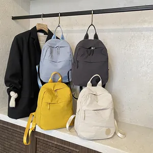 Zaini minimalisti in nylon ad alta capacità in blu, grigio, giallo e bianco crema