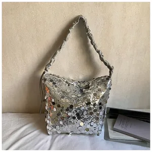 Silver sequin shoulder bag with trendy pleated scrunchie strap and spacious interior