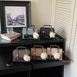 Chic retro square crossbody bag in five colors with plush charm for women
