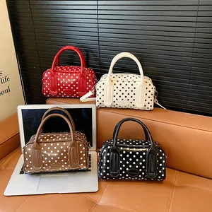 French vintage polka dot handbag set in red, white, brown, and black colors