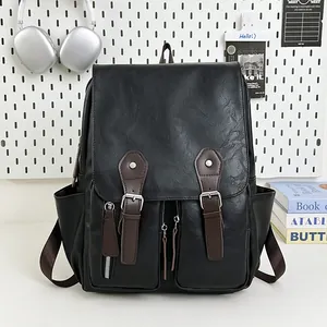Schwarzer Rucksack aus PU-Leder mit Lychee-Muster, braunen Riemen und Silberschnallen