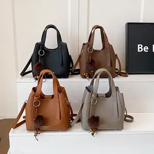 Borse a secchiello minimaliste in pelle in quattro colori con manico e tracolla
