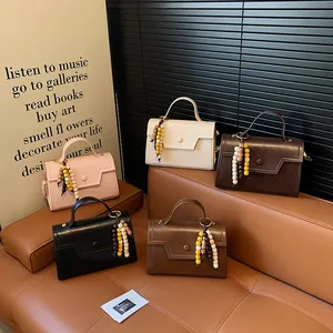 Retro small square handbags with colorful wooden bead tassels in five classic colors