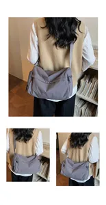 Detailed view of the water-resistant nylon fabric and spacious compartments of the crossbody bag