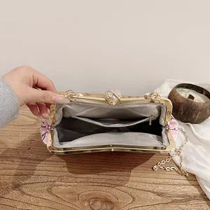 Vintage pink floral embroidery handbag with gold metal frame and pearl clasp