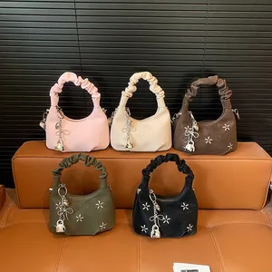 Chic hobo cloud bags with star studs and decorative charms in five trendy colors
