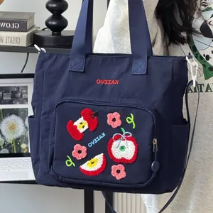 Sac fourre-tout en nylon bleu marine avec broderie pomme pour étudiante et voyage