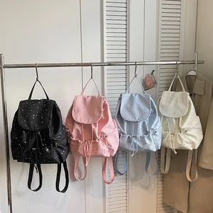 Mini sacs à dos légers pour femmes avec motif d'étoiles en noir, rose, bleu et blanc