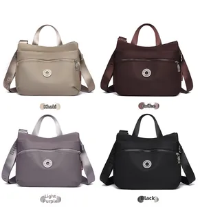 Four colors of lightweight nylon crossbody bags in khaki, coffee, purple, and black