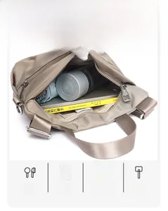 Top view of khaki nylon crossbody bag showing large capacity with daily essentials