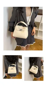 Three views showing an off-white textured leather doctor bag with silver twist lock and strap