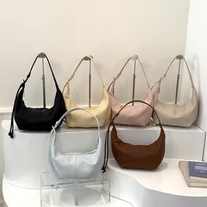 Minimalist half-moon underarm bag set in six colors with adjustable shoulder straps