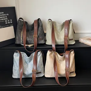Large minimalist tote bags in grey and olive green with adjustable leather straps