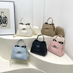 Retro minimalist bucket handbag set in five colors on a clean white display stand