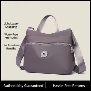 Morandi purple nylon crossbody bag with water-resistant fabric and wide strap