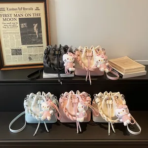 Chic vintage bucket bags in five colors with woven straps and cute plush pendant