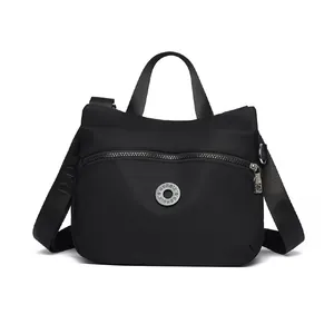 Classic black high-capacity tote with adjustable logo strap for work and daily use
