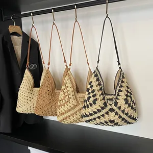 Handwoven straw tote bags in four neutral colors with slim straps for summer holidays