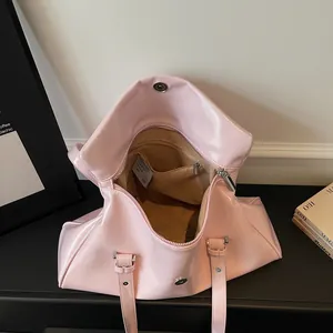 Pink glossy tote bag with polished finish shown from top view with interior pocket
