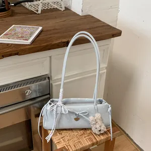 Chic light blue polka dot shoulder bag with lace ribbon and cute puppy charm