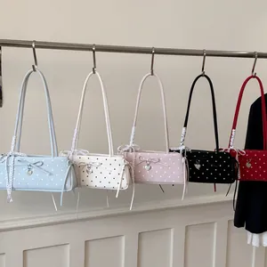 Polka dot baguette shoulder bags with bows and heart pendants in five pastel colors