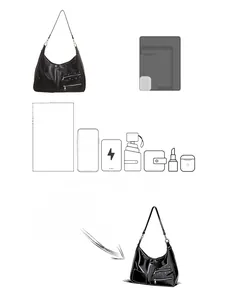 Detailed view of the large black tote bag capacity showing iPad and everyday essentials