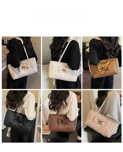 Detailed view of woven tote bags with large bow accents in six versatile color options