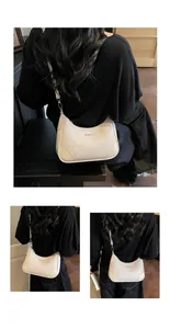 Three views showing the scale and fit of the white leather hobo bag on a person