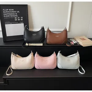 Chic leather hobo bags in four colors featuring elegant half-moon shapes and lychee texture