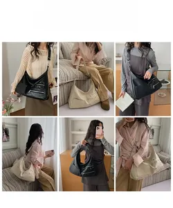 Detailed views of the large crescent hobo bag with rivets in black and beige finishes