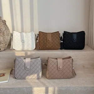 Sacs seaux élégants pour femmes en cinq couleurs avec texture matelassée et gland