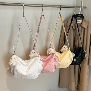 Stylish star-printed half-moon tote bags in four colors with cute plush bunny pendants