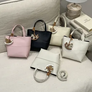 Fashionable mini tote bags in five colors with horse charms and adjustable straps